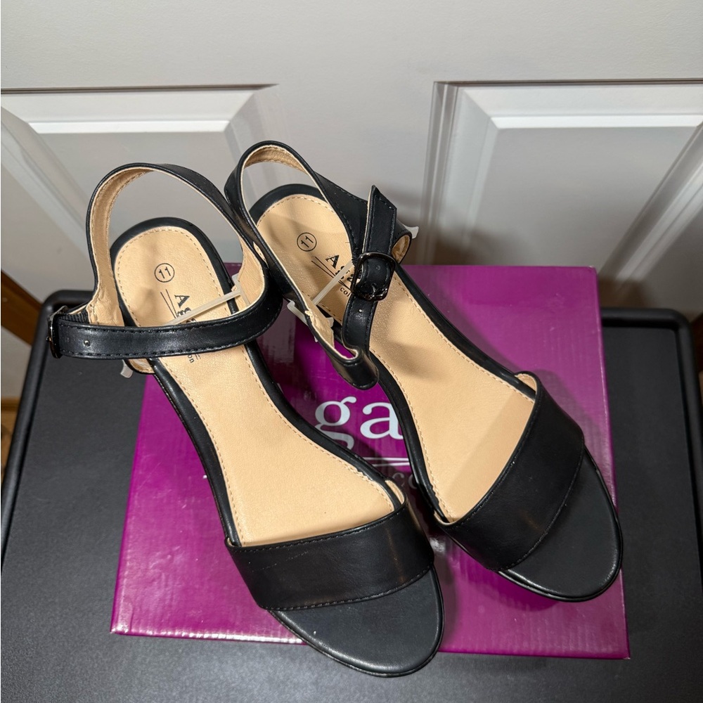 Black Heels with Sleek Ankle Strap and Minimalist Design